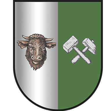Ein vertikal geteiltes Schild: die linke Hälfte ist silbern mit einem braunen Stierkopf, die rechte Hälfte ist grün mit einem weißen gekreuzten Hammer und einem Vorschlaghammer.